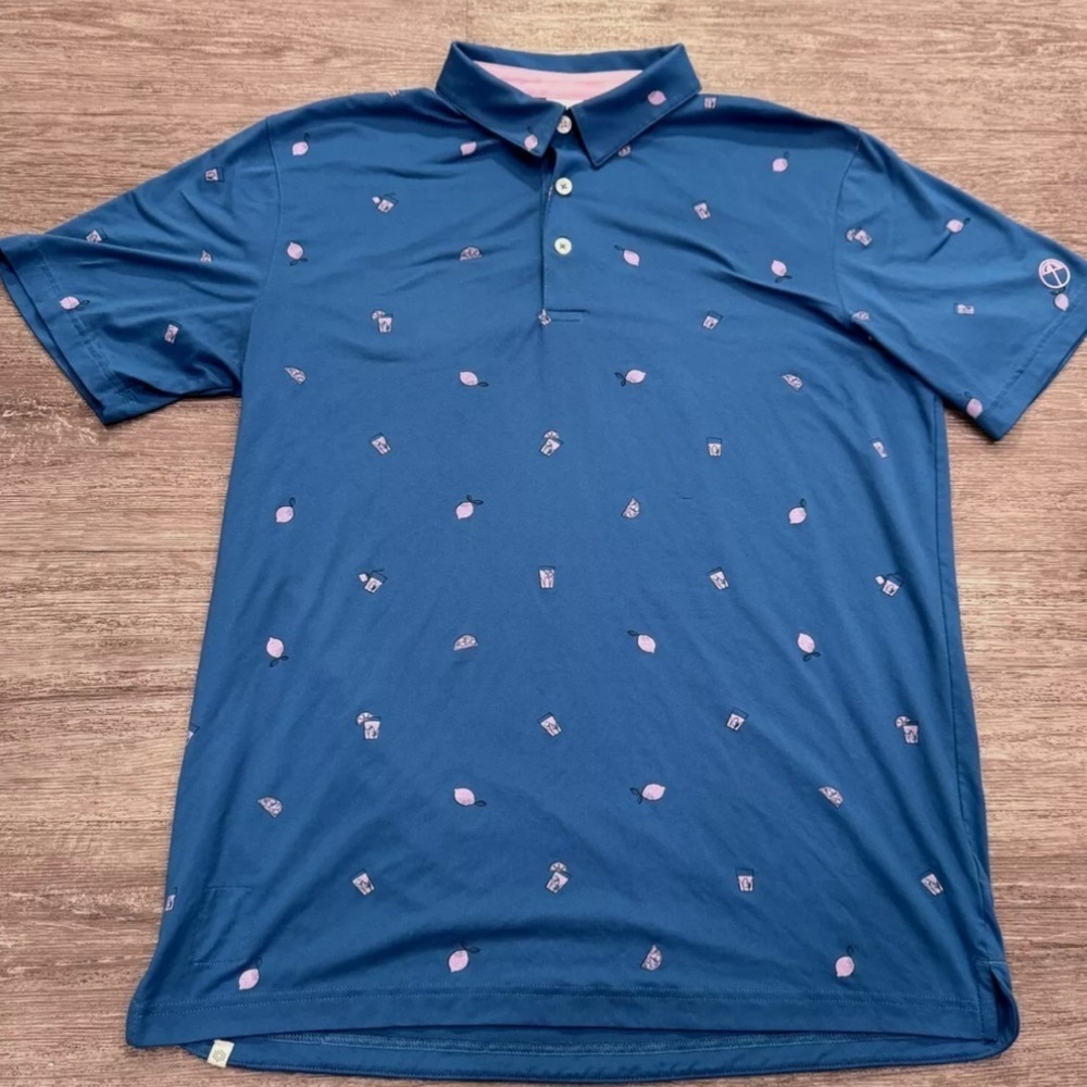 NWT- Puma Arnold Palmer Men’s Polo Shirt- Blue Short Sleeve All Over Print Logo